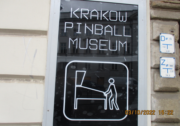 Pinball Museum Krakow sign at the entrance